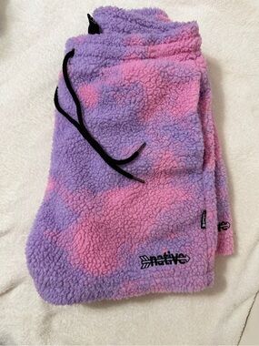 Native Language Co. Purple and Pink Sherpa shorts.